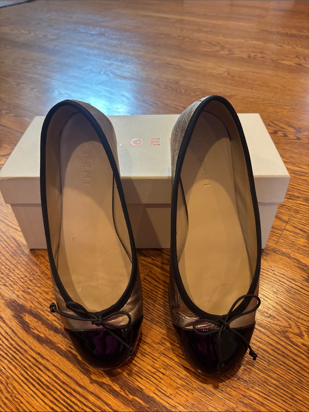 M. Gemi Metallic Gold Ballet Flats with Black Trim